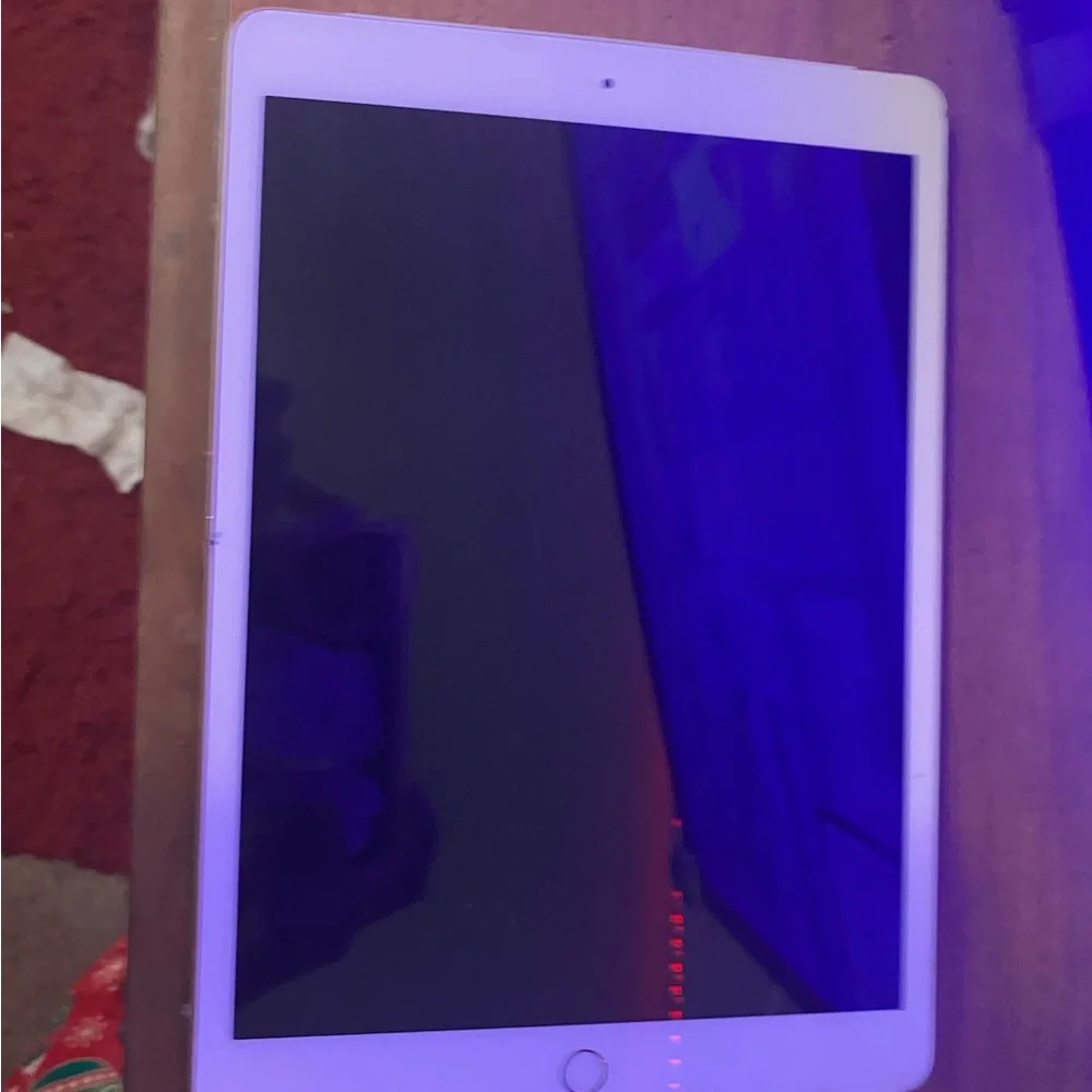 Apple Gold and Pink Tablet with Sleek Design and Advanced Features